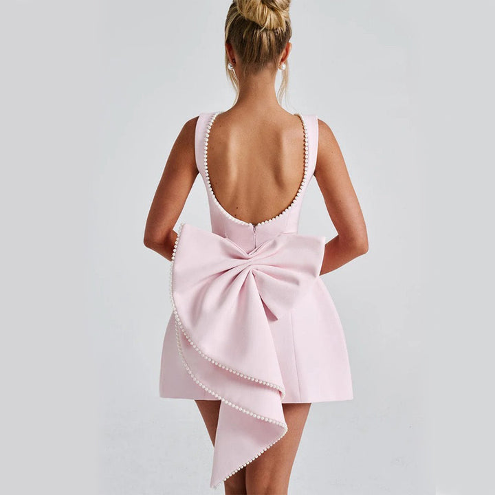 Abito mini donna a trapezio con schiena scoperta – senza maniche, fiocco perlato