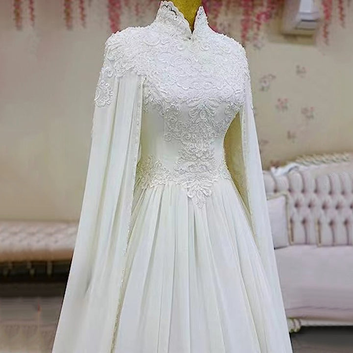 Abito da sposa donna sirena in pizzo – lungo con mantella trasparente
