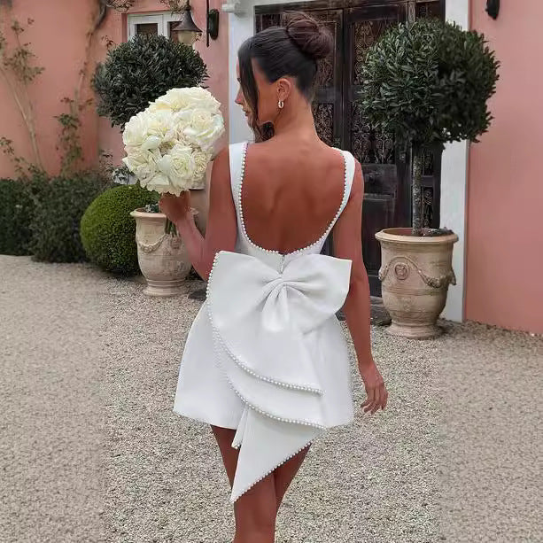 Abito mini donna a trapezio con schiena scoperta – senza maniche, fiocco perlato