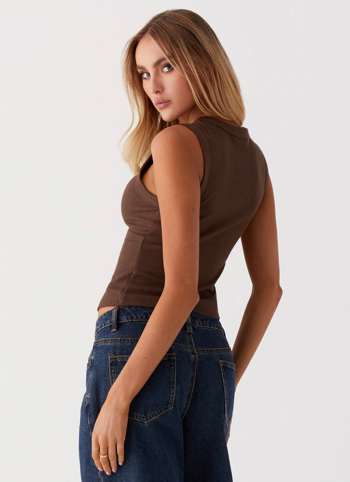 Top corto da donna in maglia a coste – Collo con bottoni senza maniche