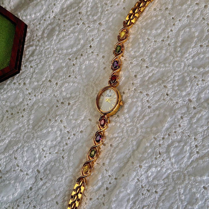 Orologio da polso donna – quadrante ovale e dettagli con gemme