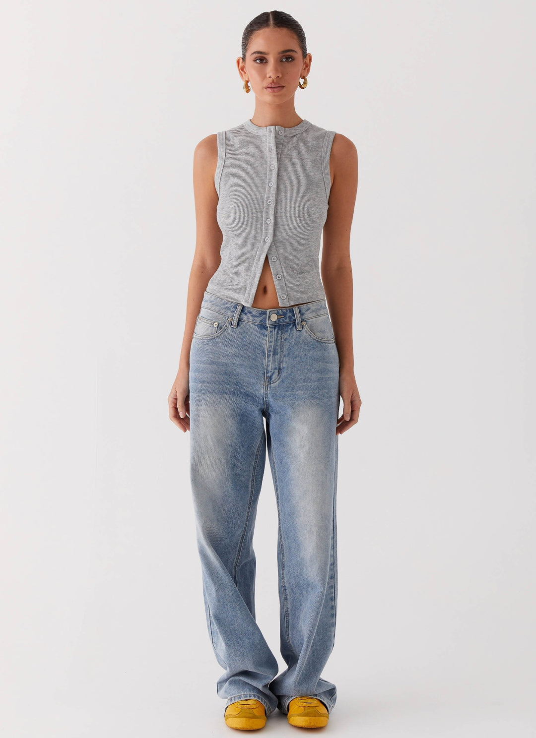 Top corto da donna in maglia a coste – Collo con bottoni senza maniche