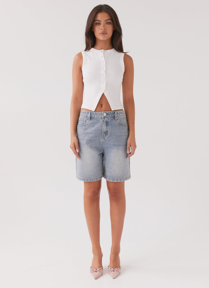 Top corto da donna in maglia a coste – Collo con bottoni senza maniche