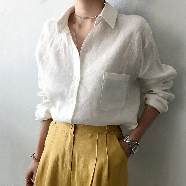 Oversize damebluse – åndbart tekstureret stof, løs pasform