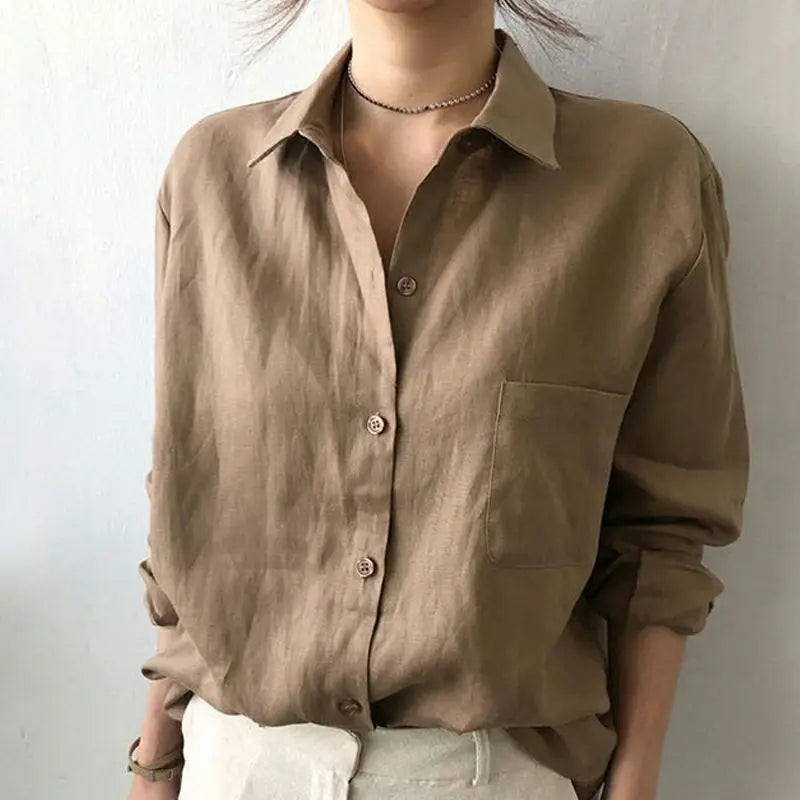 Oversize damebluse – åndbart tekstureret stof, løs pasform