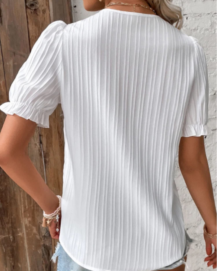 Blusa donna con scollo a V in pizzo – taglio ampio leggero ed elegante