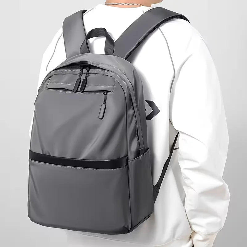 Zaino da uomo in tessuto strutturato – impermeabile e con più tasche