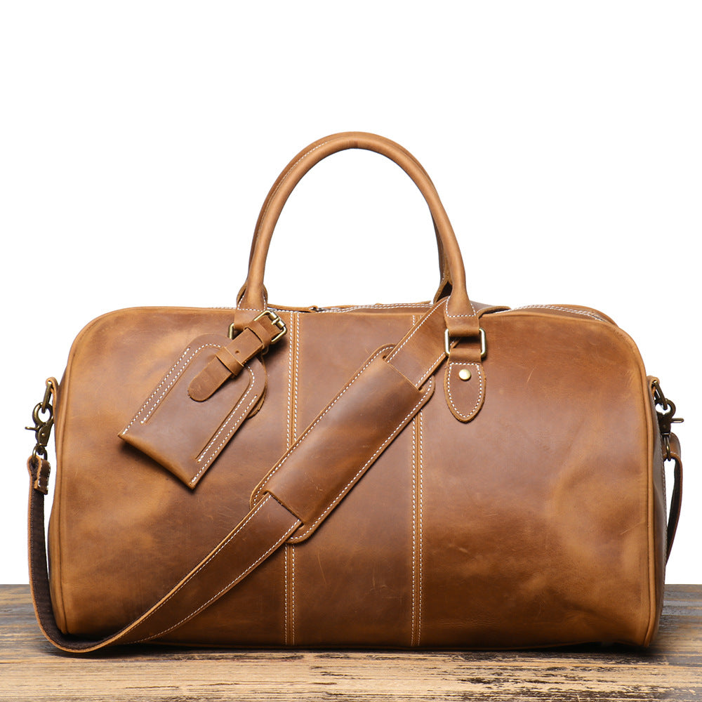 Herren-Reisetasche aus echtem Leder – Strukturierte Silhouette und abnehmbare Schulterriemen