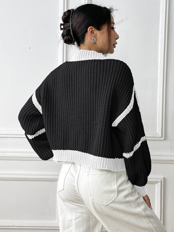 Damesvest van structuurbreisel - kort, casual en open model