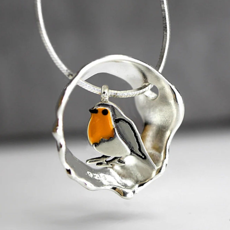 Ketting Dames met opengewerkte vogelhangertje – retro geometrisch patroon