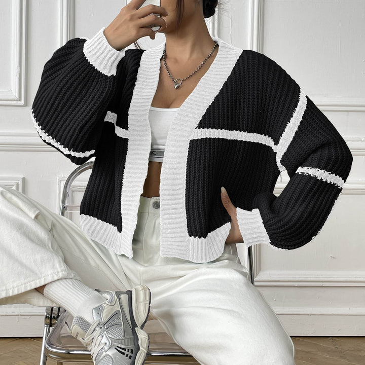 Damesvest van structuurbreisel - kort, casual en open model