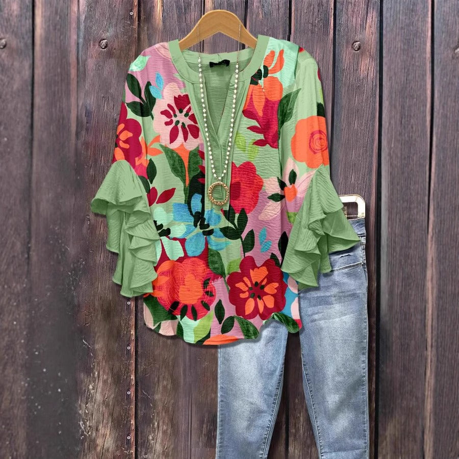 Blusa donna con stampa botanica – maniche a volant e scollo a V