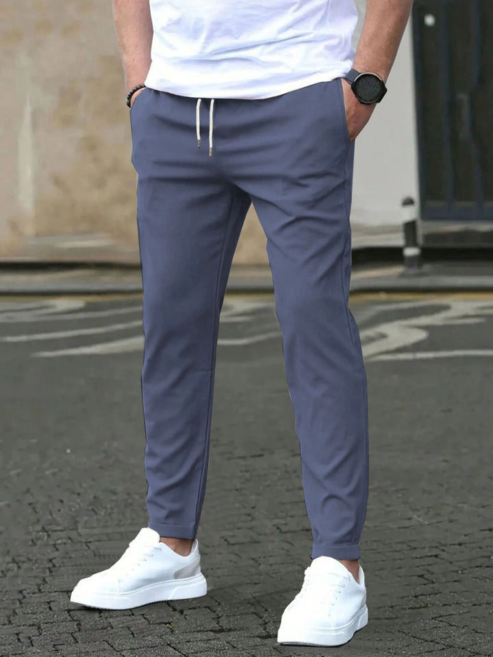 Pantaloni Uomo Slim Casual – Tessuto Leggero e Morbido Intessuto