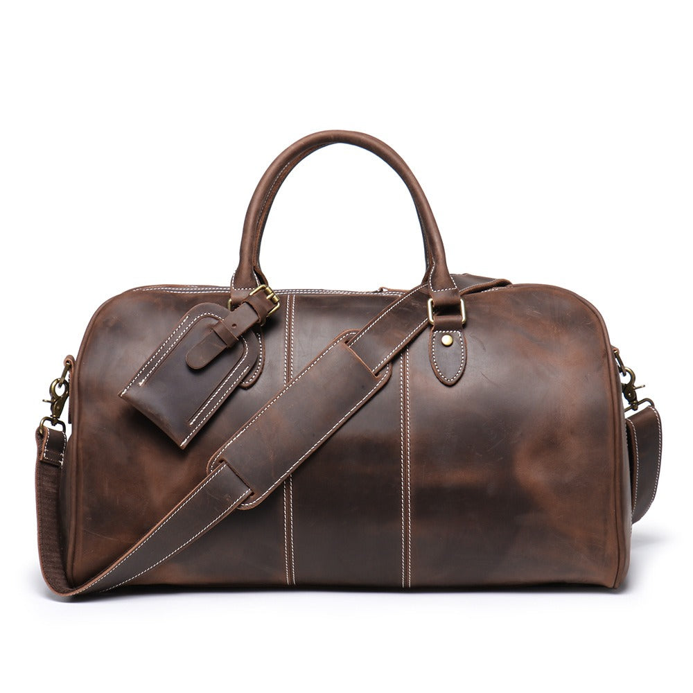 Herren-Reisetasche aus echtem Leder – Strukturierte Silhouette und abnehmbare Schulterriemen