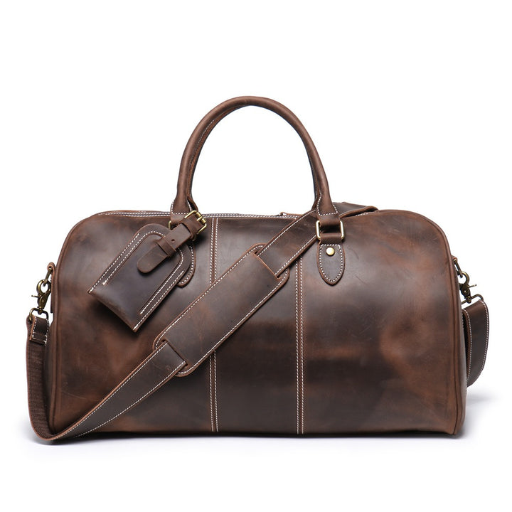Herren-Reisetasche aus echtem Leder – Strukturierte Silhouette und abnehmbare Schulterriemen