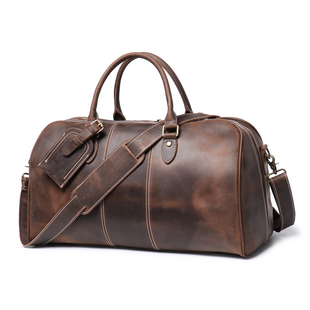 Herren-Reisetasche aus echtem Leder – Strukturierte Silhouette und abnehmbare Schulterriemen