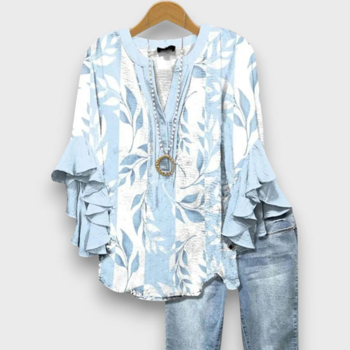 Blusa donna con stampa botanica – maniche a volant e scollo a V