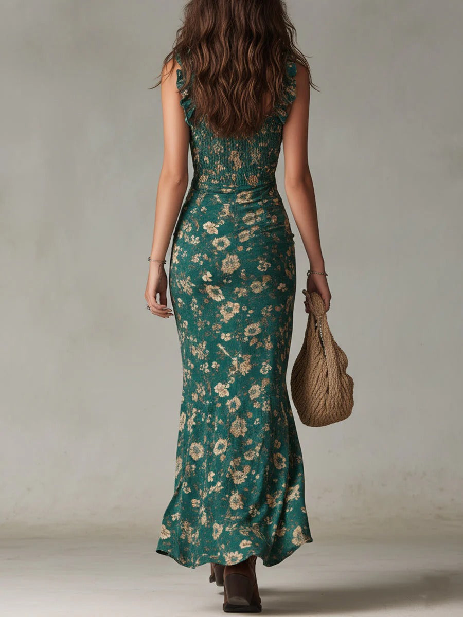 Langes Damenkleid mit Blumenmuster – gerafftes Bustier und asymmetrische Volants